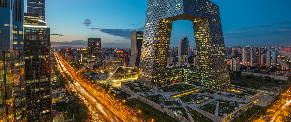 Beijing city skyline at dusk representing Asian markets, AI leadership, regional equity opportunities and market concentration.