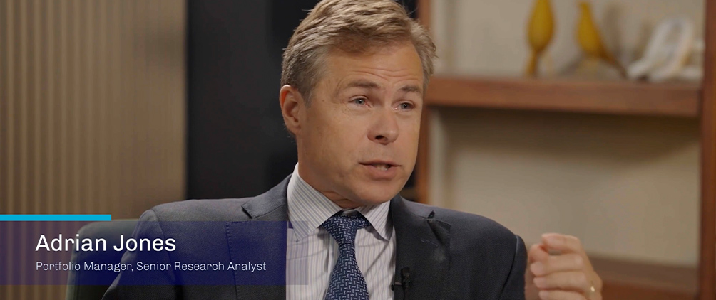 Adrian Jones of First Eagle Investments speaking during a video interview.