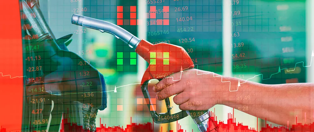 Gas pump with market data overlay representing inflation, energy prices and economic pressure.